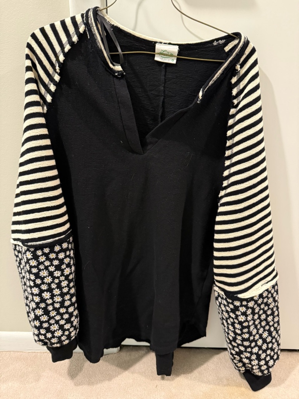 New Me Black Pullover with Black & White Striped & Floral Sleeves